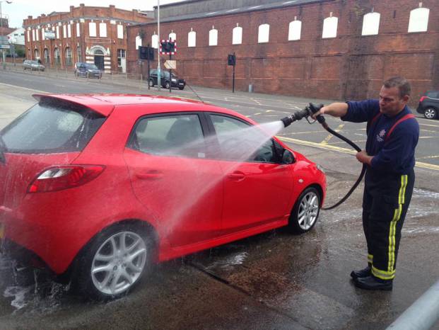 YEOVIL NEWS: Fire station charity car wash is a big splash! Photo 1