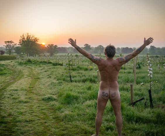 SOUTH SOMERSET NEWS: Cheeky cider lovers worship the apple blossom Photo 1