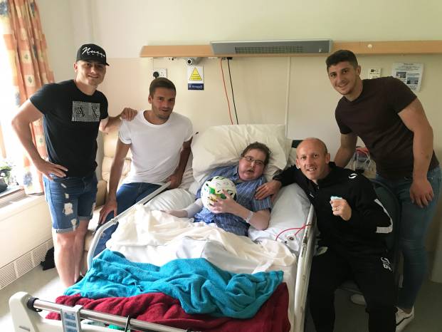 GLOVERS NEWS: Yeovil Town group humbled by visit to fan in hospice