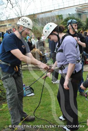 Charity Abseil: Taking the plunge - March 9, 2013. Making sure everything is secure! Photo 7