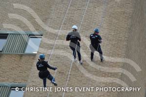 Charity Abseil: Taking the plunge - March 9, 2013. A trio from the Wezzie Gezzie make their descent. Photo 12