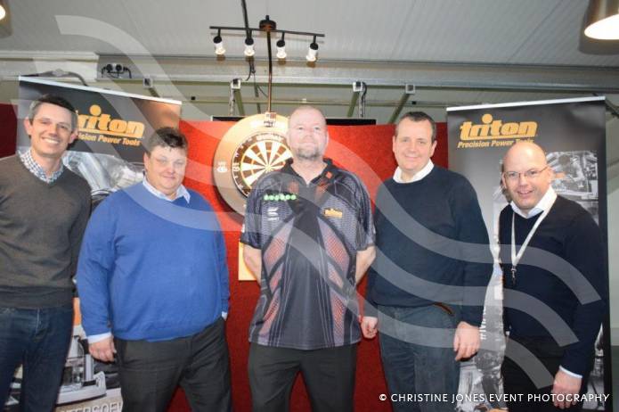 BUSINESS: Raymond van Barneveld is on target with Triton tools