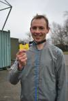 Yeovil Half Marathon - The Top 20: Winner Ben Tickner with his finisher's medal at the end of the half marathon on March 24, 2013. Photo 1