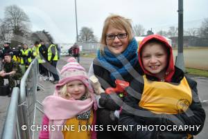 Yeovil Half Marathon - All Smiles: There were plenty of smiles at the half marathon. Here's a family of spectators who brought a hot water bottle to stay warm while waiting for the runners to return. Photo 1