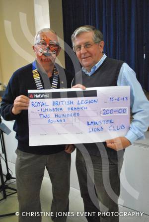Ilminster Lions Club Fete - June 15, 2013: Face-painted Lions Club president Peter Marshall presents a cheque for £200 to John Goodall, of the Ilminster branch of the Royal British Legion. Photo 5