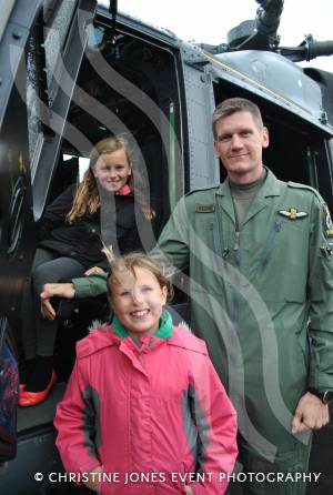 RNAS Merryfield Open Evening - June 12, 2013: Young visitors on board a Lynx helicopter with a member of personnel from RNAS Yeovilton. Photo 3