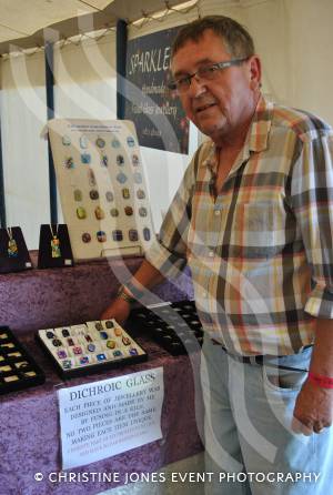 Chris Harper, of Ashill, mans his wife Margaret's stall of fused glass and hand-felted items
