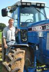 Michael Butland, of Hambridge, with his Ford 8210 Series 2 tractor at Yesterday's Farming 2012 at Haselbury Plucknett