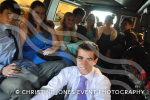 Prom-goers arrive in a stretched limousine