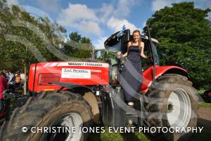Megan Bessell arrives by tractor.