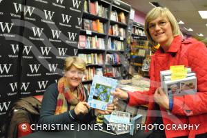 Angie Cox, right presents a copy of her own book Forget-Me-Not to Clare Balding at Waterstone's bookshop in Yeovil on October 8, 2012