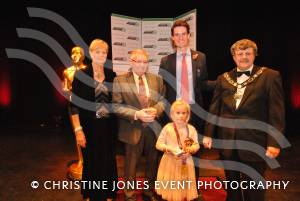 Derek White and Faith Watson, six, receive the Lifetime Achievement awards at the Gold Star Awards at the Octagon Theatre on October 30, 2012, from Cllrs Mike Best and Sylvia Seal and Olympic gold medal winner Peter Wilson