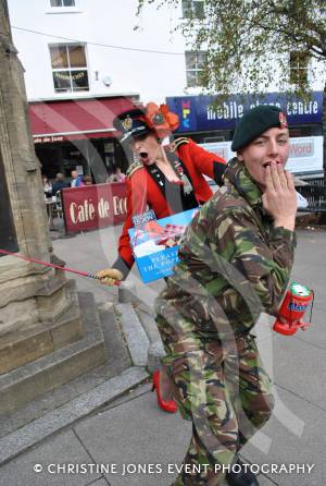 Spot of fun as Corporal Josh Williams, of Yeovil Army Cadets, gets into trouble with burlesque dancer Jo Freestone, as Major Outrage, in Yeovil town centre on November 3, 2012, while collecting for the Poppy Appeal