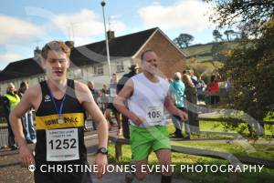 Alan Cheffey (no 1051) finishes the Ilminster Lions 10k, while Will Bond (no 1252) already has his medal.