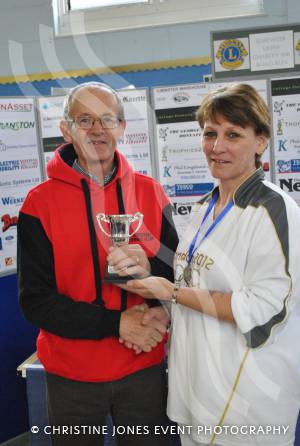 Age category winner Clive Harwood with Olympic torchbearer Tonia White.