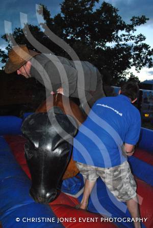 Home Farm Fest Part 3 - June 7, 2014: There was plenty of fun on Day Two of Home Farm 2014: O dear. Steve Sowden, of Yeovil Press, tries to ride the Rodeo Bull at the Fun Zone. Photo 21