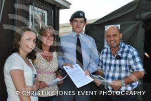 Ilminster Air Training Corps open evening - June 2014: Cadet Luke Mitchell welcomes Michelle and Darren Woolcott and their daughter Ellie Woolcott to the Ilminster ATC open evening. Photo 7