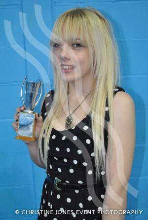 Emily Sturman with the Karl Garrett Cup for achievement in drama. Photo 13.