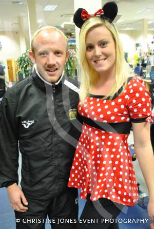 Samantha Trott gets ready to take calls from people wanting to make donations for Children in Need with Yeovil Town FC coach Darren Way at Screwfix in Yeovil on Friday, November 16, 2012. Photo 12