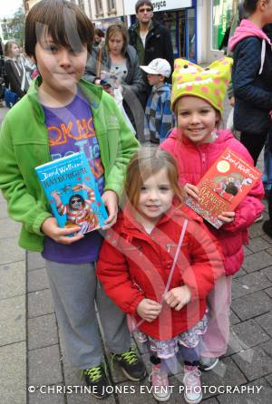 Callum Coleman, ten, Ruby Coleman, eight, and Maisie Coleman, four, outside Waterstone's in Yeovil on December 1, 2012, wait to meet David Walliams. Photo 19