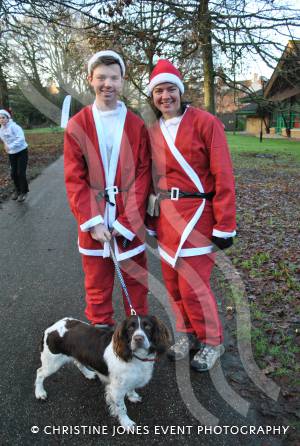 Santa Dash in Yeovil - Dec 16, 2012: Greg and Hilary Morris with Max the Dog. Photo 2