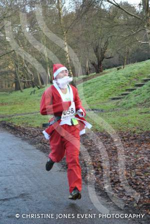 Santa Dash in Yeovil - Dec 16, 2012: Winner Robbie Hawkins comes in to finish. Photo 21