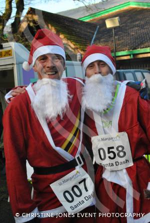 Santa Dash in Yeovil - Dec 16, 2012: Winner Robbie Hawkins, right, and runner-up Robin-Mark Schols. Photo 23