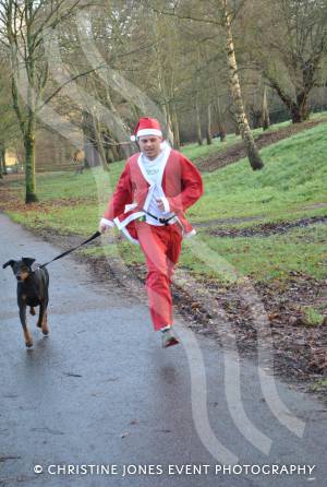 Santa Dash in Yeovil - Dec 16, 2012: Fifth-placed Cris Macpherson and Max the Dog. Photo 26