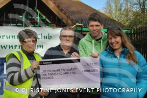 Santa Dash in Yeovil - Dec 16, 2012: Events fundraiser for St Margaret's Hospice, Brooke Brownlow, right, was on hand to receive a cheque from the Yeovil Town Road Running Club. Photo 79