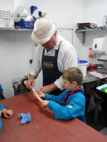CLUBS AND SOCIETIES: Beaver Scouts make sausages at Bonners in Ilminster