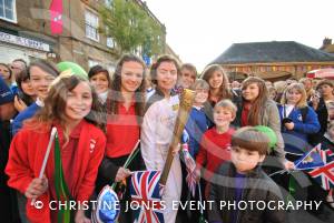 May 2012: An Olympic torch-bearer with youngsters at Ilminster.