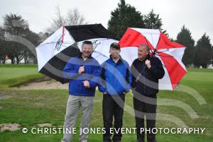 The annual Captain's Drive-in at Windwhistle Golf Club on January 12, 2013. Outgoing men's captain Peter Hamilton-Walsh, centre, with two pals in the rain at Windwhistle. Photo 12