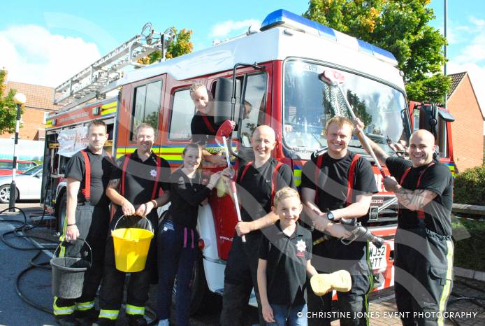 SOUTH SOMERSET NEWS: Firefighters hose down cars for charity funds
